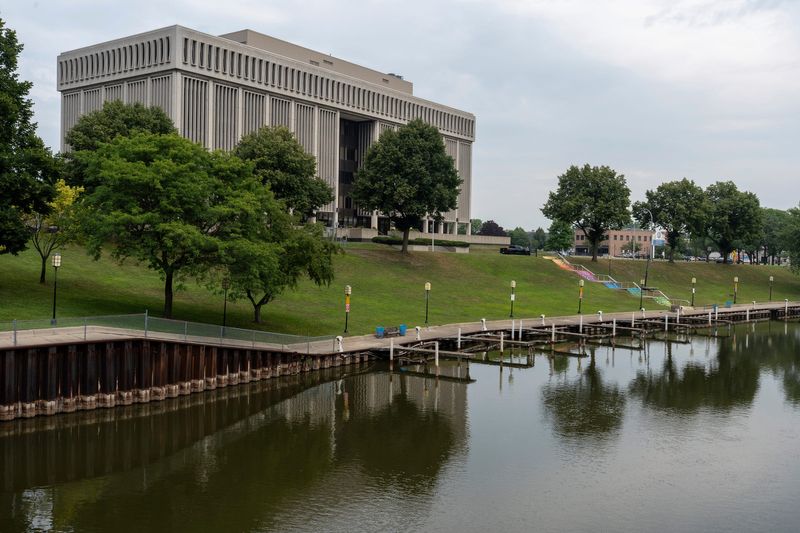 The Clinton River flows past the Macomb County 16th Judicial Circuit Court in downtown Mount Clemens on Wednesday, July 16, 2025.