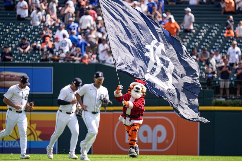 Detroit Tigers mascot Paws celebrates 10-4 win over Toronto Blue Jays at Comerica Park in Detroit on Sunday, July 27, 2025.