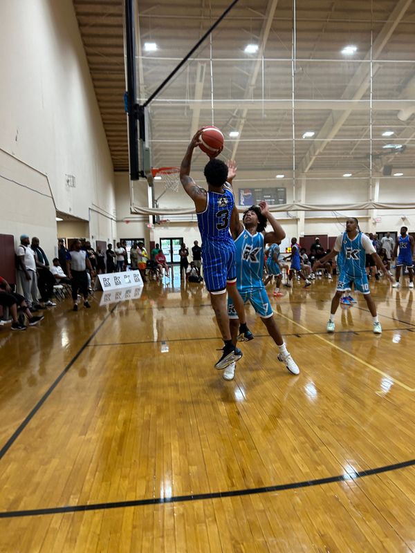 Trey Burke takes a fadeaway jumper while playing in the Kingdom Summer League at New Covenant Believers’ Church on July 27.