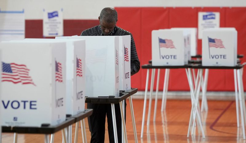 Neal Willis, 61 of Detroit votes in the primary election inside The Matrix Center gymnasium where precincts 46, 49, 77 and 205 are located in Detroit on Tuesday, August 5, 2025.