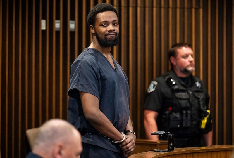 DeAndre Booker at his preliminary examination  in August 2025 on charges of murdering his girlfriend, Ashley Elkins, who has been missing since January 2025. Katy Kildee / The Detroit News