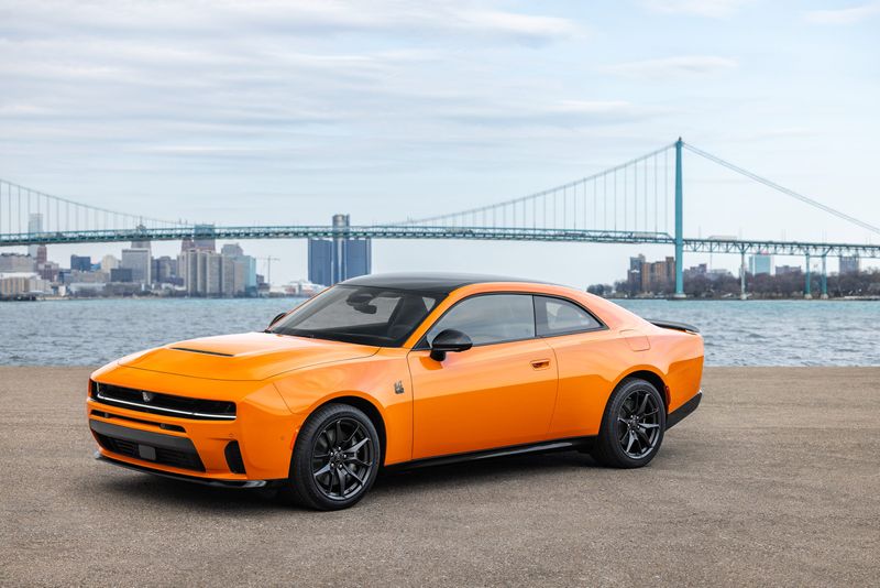 Dodge's newly unveiled SIXPACK-powered 2026 Dodge Charger Scat Pack Plus in Peel Out Orange is pictured in Detroit.
