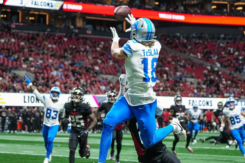 Aug 8, 2025; Atlanta, Georgia, USA; Detroit Lions wide receiver Isaac TeSlaa (18) catches a touchdown pass behind Atlanta Falcons cornerback Dee Alford (20) during the second quarter at Mercedes-Benz Stadium. Mandatory Credit: Dale Zanine-Imagn Images