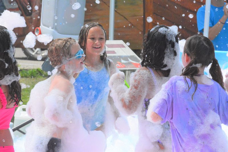 Kids enjoy themselves during the Fantastic Foam Finale Party held by the Cheboygan Area Public Library at Washington Park on Saturday, Aug. 9, 2025. The event was to celebrate a summer of colorful reading.