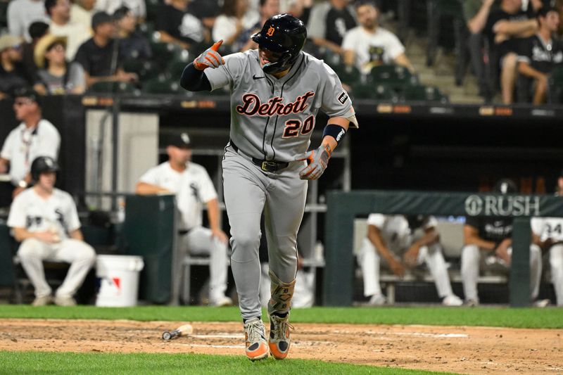 Aug 11, 2025; Chicago, Illinois, USA; Detroit Tigers first base Spencer Torkelson (20) points after he hits a home run during the ninth inning against the Chicago White Sox at Rate Field. Mandatory Credit: Matt Marton-Imagn Images