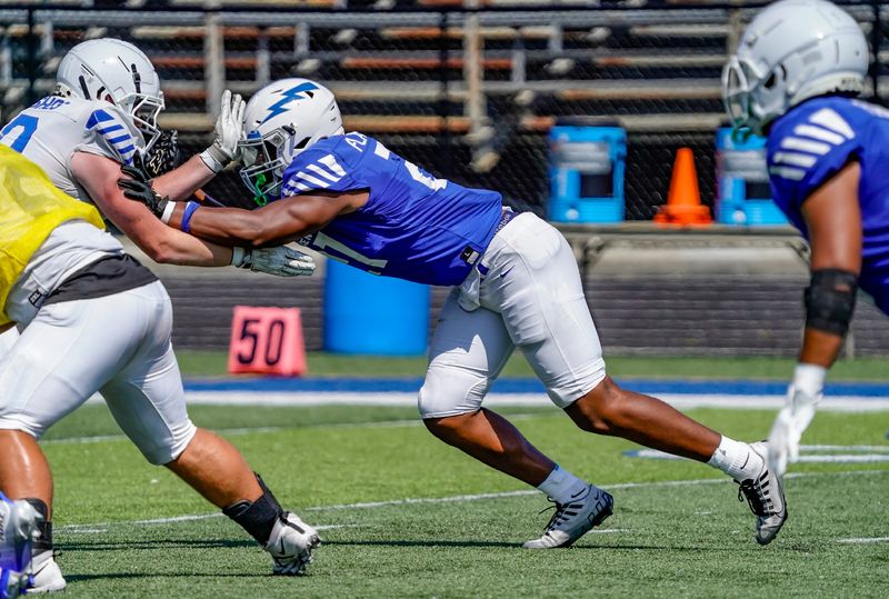 Franklin Central defensive end Jayce Brewer (21) takes part in a scrimmage on Saturday, Aug. 9, 2025, at Franklin Central football stadium in Indianapolis.