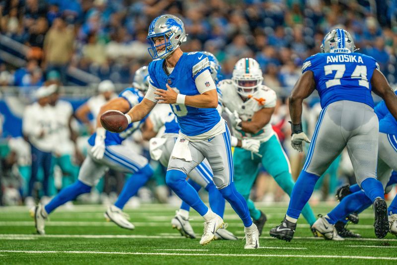 Detroit Lions quarterback Kyle Allen looks to hand off the ball during the first quarter of the preseason game at Ford Field in Detroit, Saturday, Aug. 16, 2025.