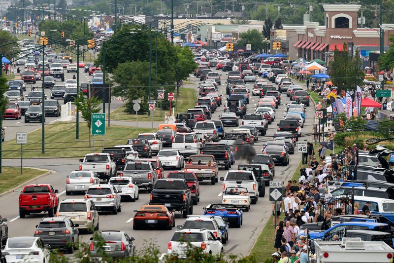 Thousands of cars make their way down Woodward Ave. in Birmingham, during the Woodward Dream Cruise, August 16, 2025.