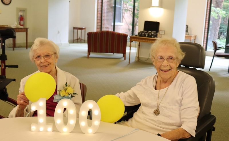 Sister Alys (Gerontia) Currier, IHM (left) turned 100-years-old on Aug. 10. She's shown with the IHM's other centenarian, Margueritte Gibbs, IHM, who turned 100 in May.