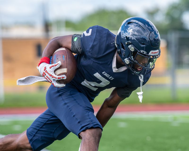Redford Thurston's Jemir Lynum catches a pass during a football practice on Thursday, Aug. 21, 2025.
