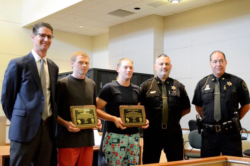 Emmet County Prosecuting Attorney Mike Schuitema (from left), Cody Parks, Charlie Parks, Sheriff Matt Leirstein and Undersheriff Rich Bankey pose for a photo on Friday, Aug. 22, 2025.