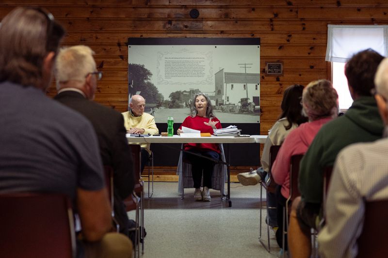 Ganges Township Planning Commission Chair Jackie DeZwaan opens a meeting to public comment Aug. 27, 2025.