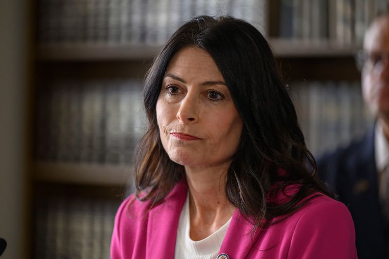 Michigan Attorney General Dana Nessel speaks during a press conference at the state offices in Cadillac Place, in Detroit, August 28, 2025. Nessel announced charges against convicted hit man Vincent Smothers in an alleged scheme to profit by falsely confessing to crimes for which other inmates were convicted.