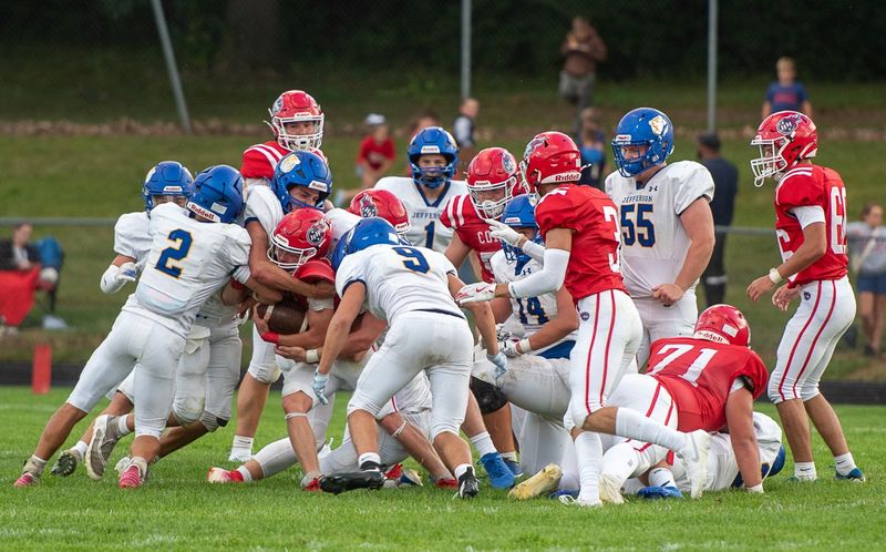 The Jefferson defense converges on a ballcarrier during a 42-28 victory over Hanover-Horton on Thursday, Aug. 28, 2025.