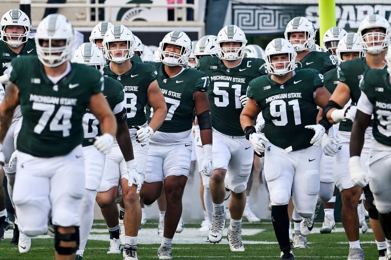 Michigan State takes the field before the football game against Western Michigan on Friday, Aug. 29, 2025, in East Lansing.