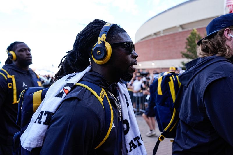 Michigan safety Rod Moore walks toward the locker room as the team arrived off the bus ahead of the New Mexico game to open the season at Michigan Stadium in Ann Arbor on Saturday, August 30, 2025.