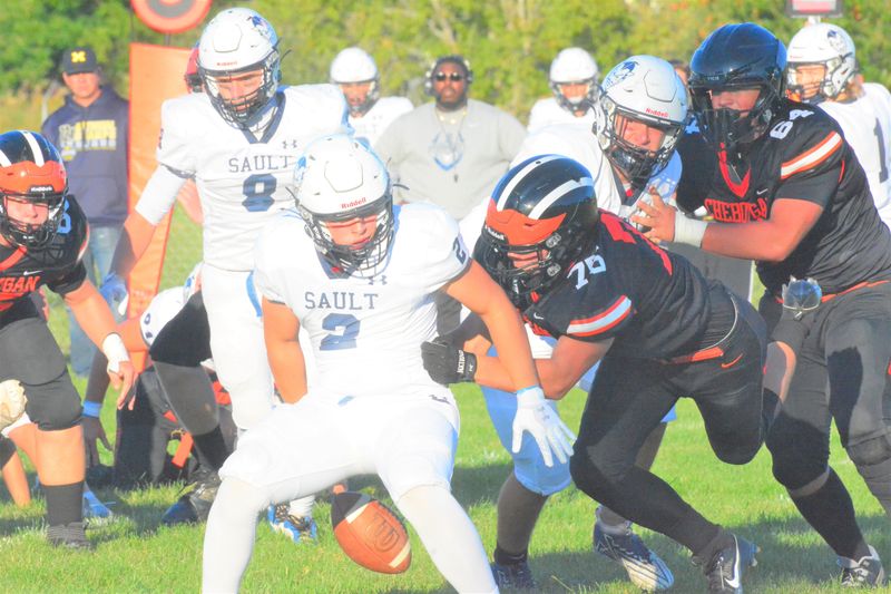 Cheboygan's David Chase (75) forces a fumble during a football game against Sault Ste. Marie on Friday, Aug. 29.