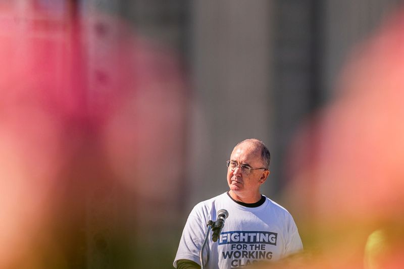 UAW President Shawn Fain speaks to attendees during Labor Day activities at Michigan Central in Detroit on Monday, Sept. 1, 2025.