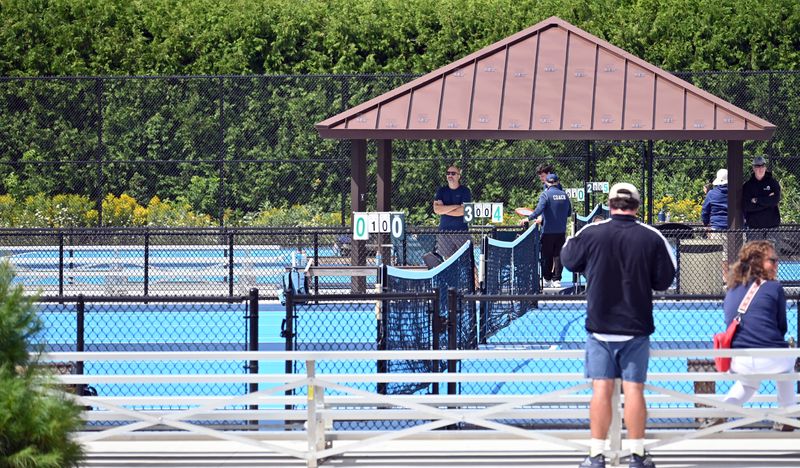 A row of bleachers and a covered seating area are both now installed near the new lower Petoskey tennis courts at the high school.