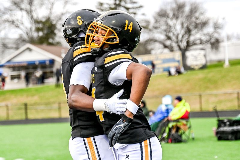 Detroit King's Don Spillers, right, celebrate his touchdown catch with Tay'Shawn Henry during the fourth quarter in the game against Mason on Saturday, Nov. 23, 2024, at Chelsea High School.