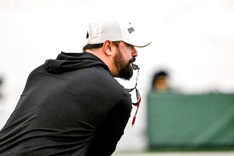 Michigan State tight ends coach Brian Wozniak looks on during football practice on Tuesday, April 8, 2025, in East Lansing.