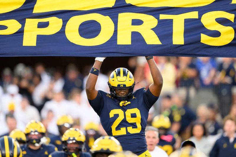 The Michigan athletics budget includes a football schedule that will have eight home games this season.