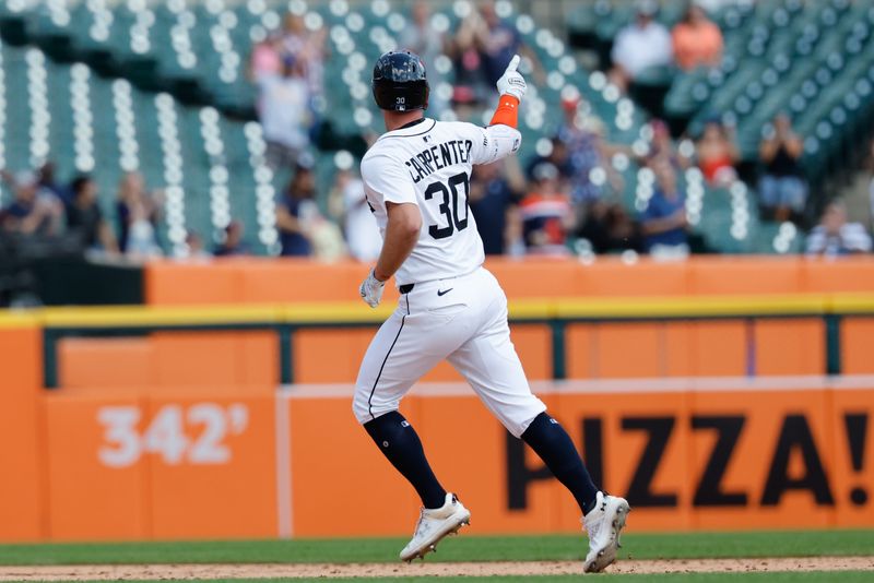 Detroit Tigers outfielder Kerry Carpenter (30) celebrates after he hits a three-run home run in the seventh inning against the New York Mets at Comerica Park in Detroit on Wednesday, Sept. 3, 2025.