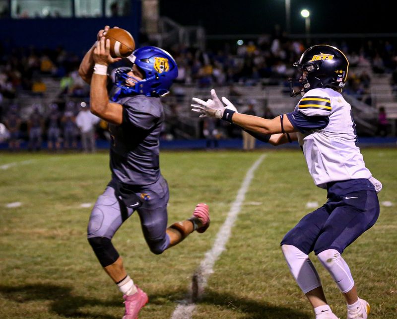 Luke Beaudrie of Jefferson intercepts a pass intended for Airport's Mason Stoneburner. He returned it for a touchdown during a 43-7 Jefferson victory on Friday, Sept. 5, 2025.