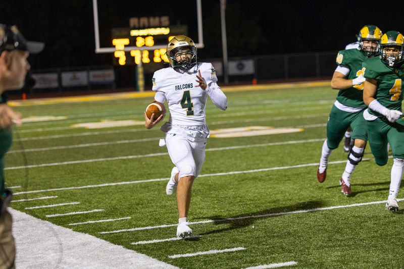 St. Mary Catholic Central quarterback Drew Ferreira runs the ball during a 36-20 win over Flat Rock on Friday, Sept. 5, 2025.
