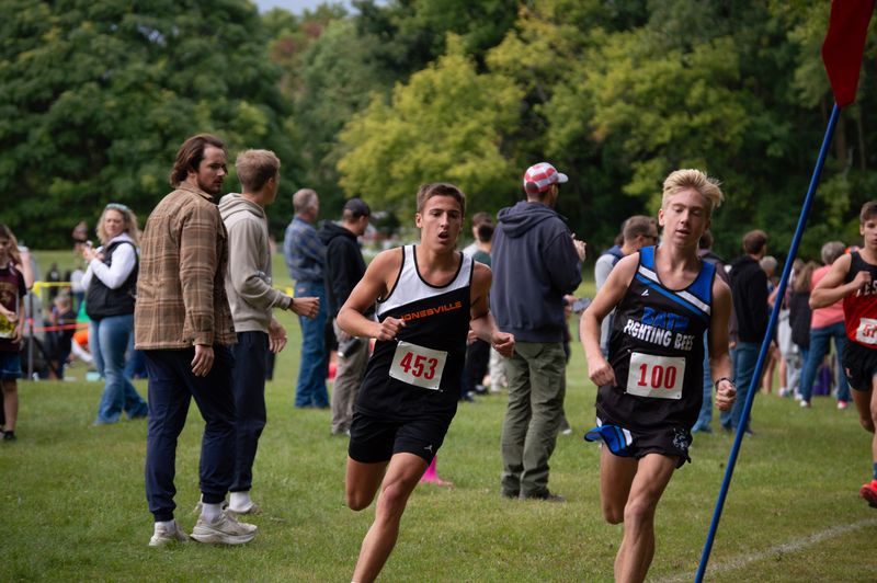 Hillsdale and Jonesville cross country runners compete at the prestigious Bret Clements Bath Invitational.