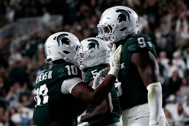 Aug 29, 2025; East Lansing, Michigan, USA; Michigan State Spartans defensive lineman Jalen Thompson (9) celebrates a tackle for a safety in the third quarter at Spartan Stadium. Mandatory Credit: Brendan Mullin-Imagn Images
