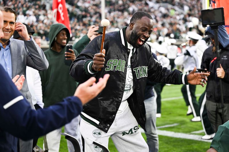 Basketball legend and Michigan State alum Draymond Green attends the Spartans' 42-40 double overtime win over Boston College.
