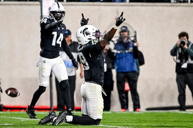 Michigan State's Armorion Smith celebrates after breaking up a pass in the end zone during the second overtime in the game against Boston College on Saturday, Sept. 6, 2025, at Spartan Stadium in East Lansing.