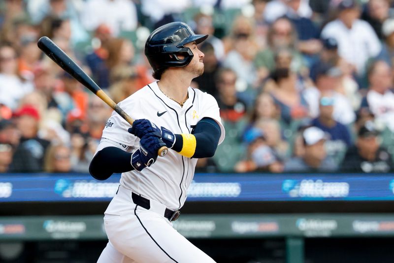 Detroit Tigers third baseman Zach McKinstry (39) hits a sacrifice fly to score a run in the fourth inning against the Chicago White Sox at Comerica Park in Detroit on Sunday, Sept. 7, 2025.