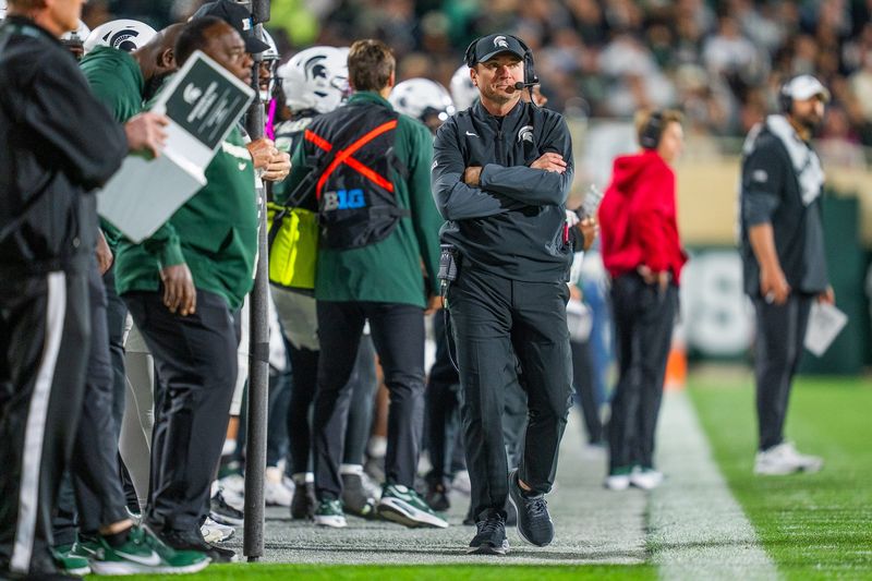 Michigan State head coach Jonathan Smith stands on the sideline during a game against Boston College during the second half at Spartan Stadium in East Lansing on Saturday, September 6, 2025.