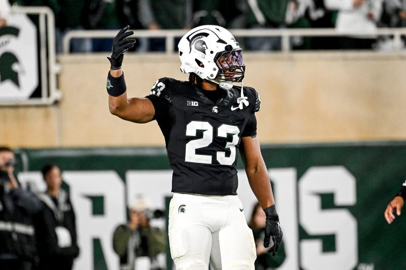 Michigan State's Darius Snow gets the crowd pumped up during the first overtime against Boston College on Saturday, Sept. 6, 2025, at Spartan Stadium in East Lansing.