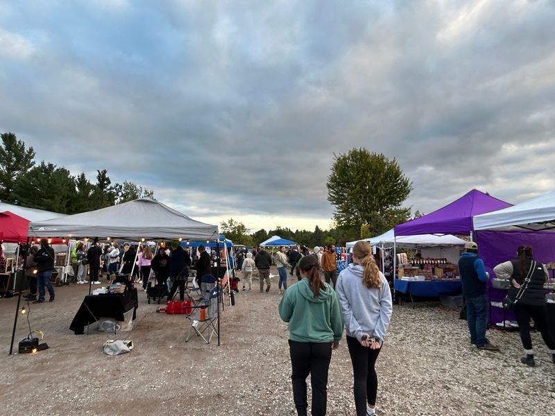 People browse the Full Moon Market at Fields Farm and Garden in Sault Ste. Marie on Sunday, Sept. 7, 2025.