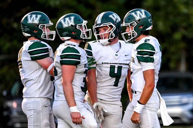 Williamston's Kaleb Nielson, right, celebrates his touchdown with teammates during the second quarter in the game against Mason on Friday, Sept. 12, 2025, at Mason High School.