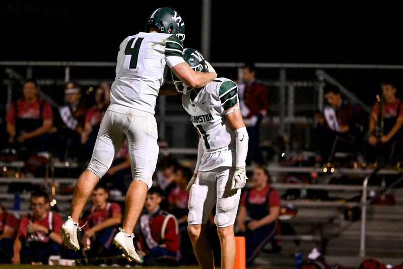 Williamston's Thomas Pratt, right, celebrates his touchdown catch with Joseph Smith during the fourth quarter in the game against Mason on Friday, Sept. 12, 2025, at Mason High School.