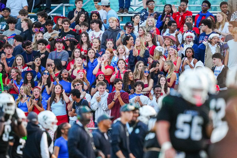 Rochester Adams fans cheer during a game against West Bloomfield at West Bloomfield High School in West Bloomfield on Friday, September 12, 2025.