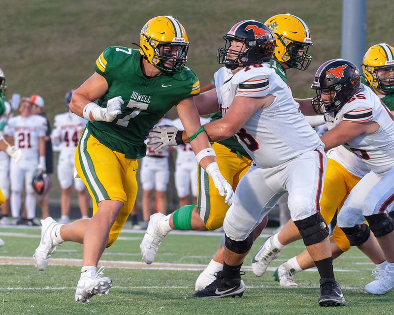 Northville's Noah Stump blocks Howell's Brody Stack on Friday, Sept. 12, 2025.