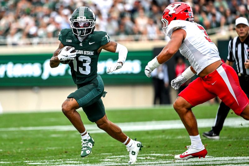 Michigan State's Chrishon McCray runs a reverse against Youngstown State during the second quarter on Saturday, Sept. 13, 2025, at Spartan Stadium in East Lansing.