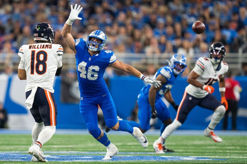 Detroit Lions linebacker Jack Campbell (46) attempts to block Chicago Bears quarterback Caleb Williams (18) during the second half at Ford Field in Detroit on Sunday, September 14, 2025.