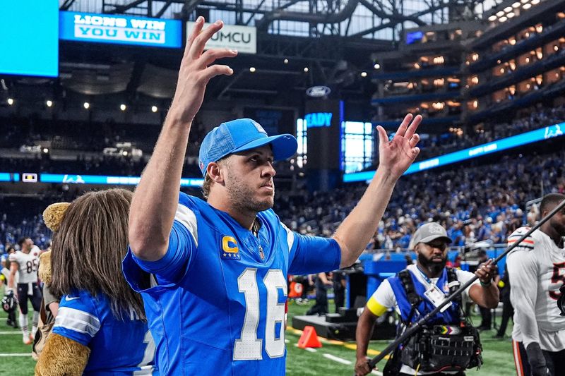Detroit Lions quarterback Jared Goff (16) cheer on as he exits the field after 52-21 win over Chicago Bears during the second half at Ford Field in Detroit on Sunday, Sept. 14, 2025.