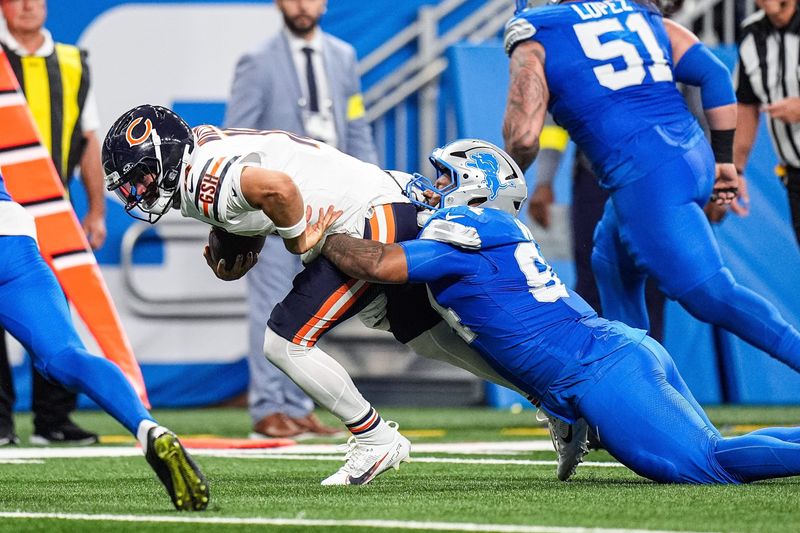 Detroit Lions defensive tackle Mekhi Wingo (94) tackles Chicago Bears quarterback Caleb Williams (18) during the first half at Ford Field in Detroit on Sunday, Sept. 14, 2025.