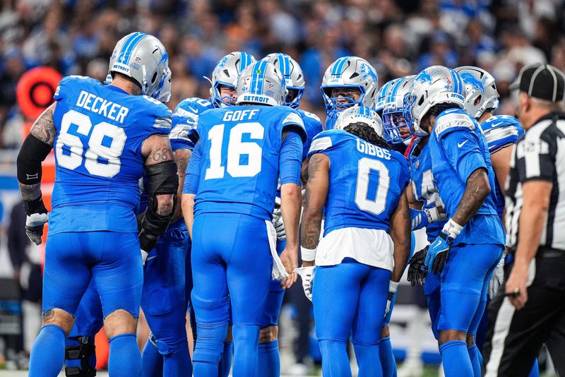 Detroit Lions offense huddle before a play against Chicago Bears during the first half at Ford Field in Detroit on Sunday, Sept. 14, 2025.