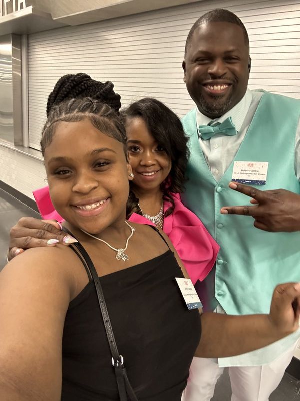 Robert and Yvette Wilkie, owners of RJ's Burgers & Ice Cream Co., with their daughter Jaylah. The Jackson restaurant will expand with a second location in East Lansing, expected to open by the end of 2025.