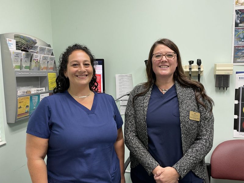 Laura Pashaian (left) and Melissa Champagne are area nurses studying to become nurse practitioners. They are currently working with Monroe's Dr. Arun Gupta.