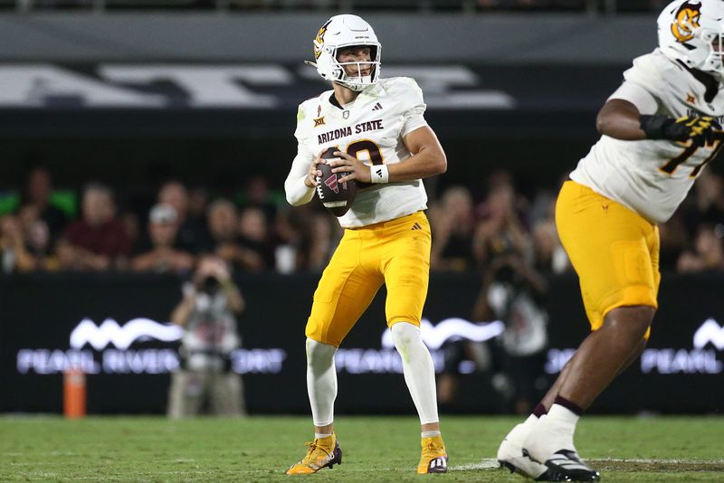 Sep 6, 2025; Starkville, Mississippi, USA; Arizona State Sun Devils quarterback Sam Leavitt (10) drops back to pass during the third quarter against the Mississippi State Bulldogs at Davis Wade Stadium at Scott Field. Mandatory Credit: Petre Thomas-Imagn Images