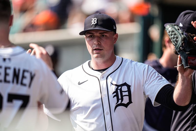 Detroit Tigers pitcher Tarik Skubal (29) high-fives teammate in the dugout after pitching sixth inning against Cleveland Guardians at Comerica Park in Detroit on Thursday, Sept. 18, 2025.